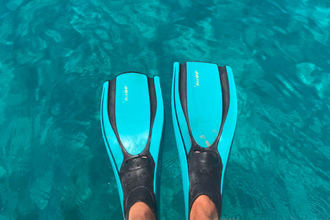 Trip to a hidden beach with crystal-clear water + snorkeling in Menorca
