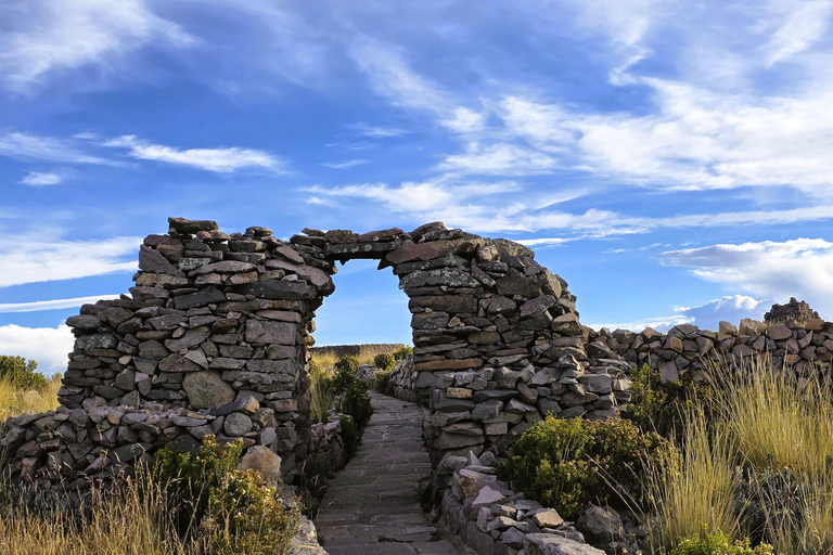 From Puno: Lake Titicaca 2-Day Tour with Homestay From Puno: 2-Day Guided Tour with Fixed Pickup Point