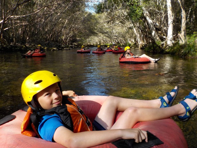 Visit From Cairns and Northern Beaches Rainforest River Tubing in Cairns
