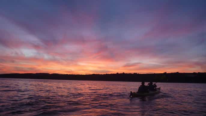 excursion en kayak de mer au coucher du soleil à québec avec du porto