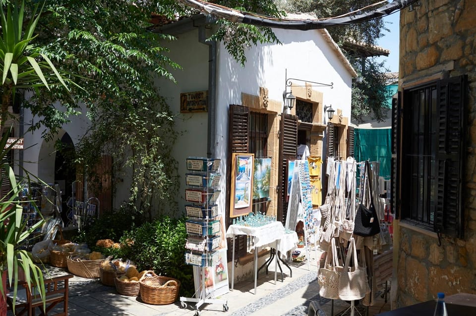 Pedestrian street inside Nicosia’s Venetian walls leading towards a guarded crossing