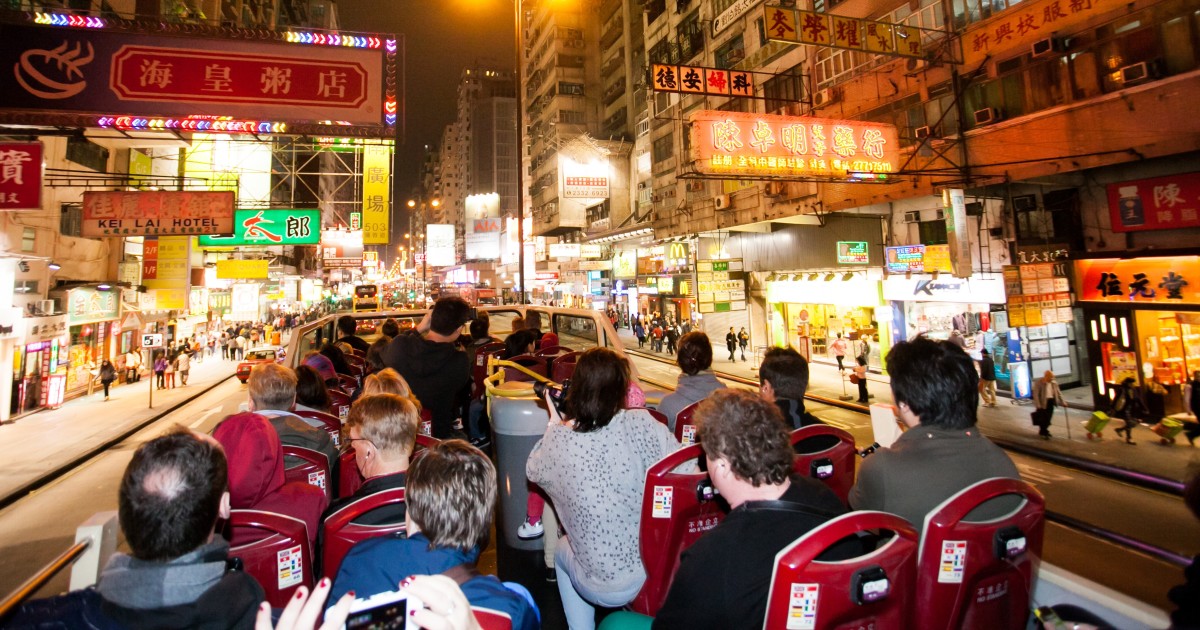 A view of Canton Road in Kowloon Hong Kong at night Stock Photo