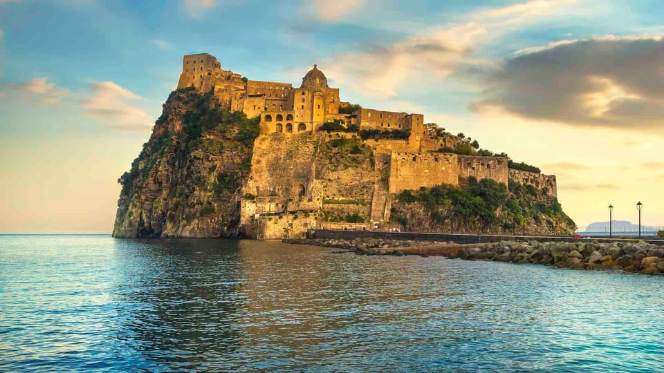 Castello Aragonese rising from its rocky islet beside Ischia Ponte