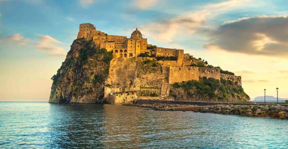 Castello Aragonese rising from its rocky islet beside Ischia Ponte