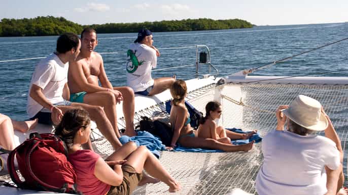 catamaran cruise tour to cayo blanco with dolphins