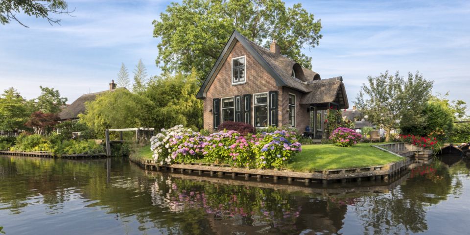 From Amsterdam: Giethoorn Day Trip with Small Electric Boat | GetYourGuide