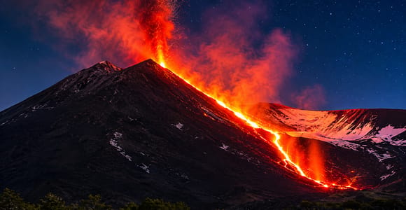 Mount Etna at sunset: pickup from Catania, with guide, food tasting and cave kit