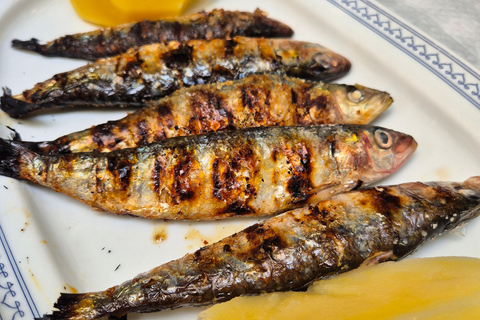 Tour gastronómico em pequenos grupos em Lisboa: coma e beba como um localTour gastronómico com guia inglês