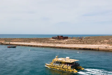 De Faro: Passeio de Barco Catamaran para a Ilha Deserta com Paragem
