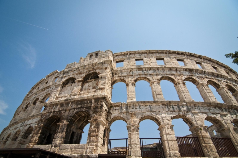 Führung ohne Anstehen: Kolosseum, Forum Romanum & PalatinTour auf Spanisch mit Abholung