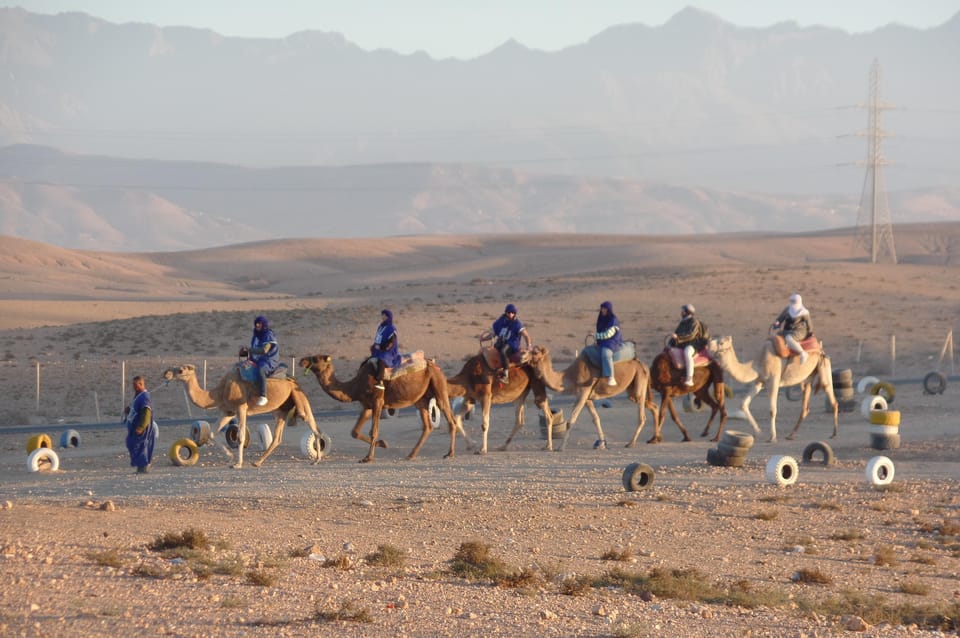 Agafay Desert Sunset, Camel Ride, and Dinner Show | GetYourGuide