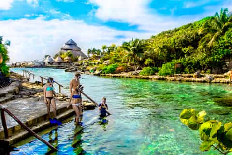 From Cancun: Xcaret Park with Night Show and Transportation