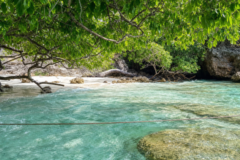From Phi Phi: Iconic Bays by Longtail—Beach, Lagoon, Snorkel Phi Phi: Longtail Join Trip — Bays, Beach & Snorkeling