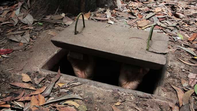 one day tour to explore cu chi tunnels and mekong delta