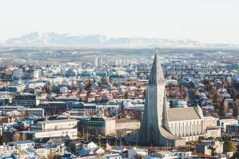 Reykjavik: panoramische helikoptervlucht met landing op de top