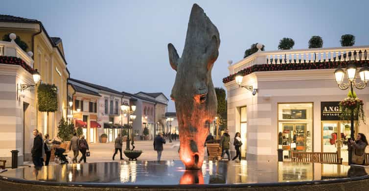 Milan: Serravalle Designer Outlet Roundtrip Bus Transfer photo 11