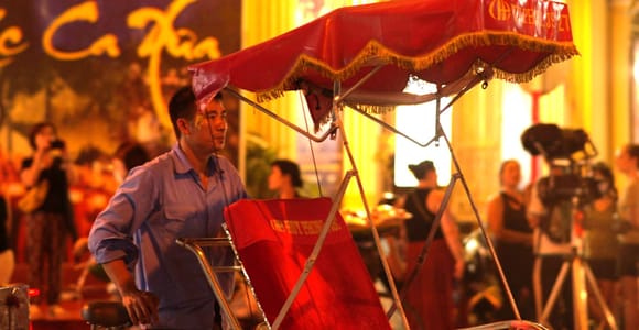 Private Evening Cyclo Tour with Water Puppet Show