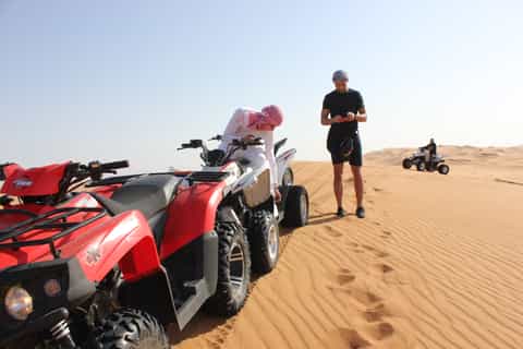 Dubai Evening Desert Quad Bike Adventure and BBQ Dinner