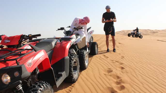 dubai evening desert quad bike adventure and bbq dinner