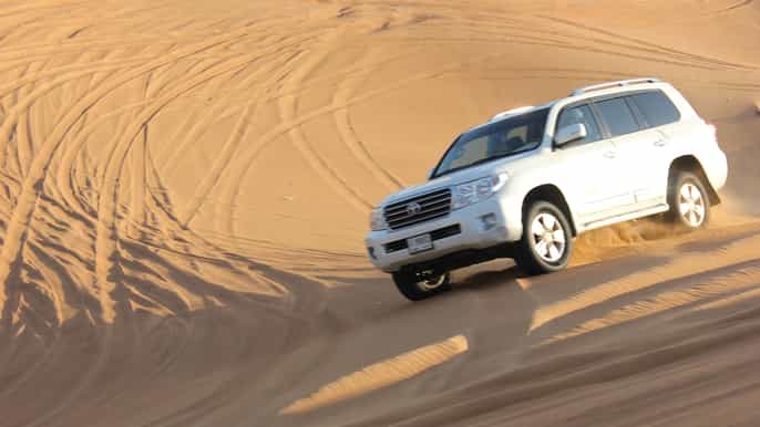 dubai halfday desert adventure tour with quad biking