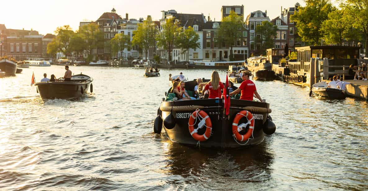Afbeelding 13 van Amsterdam: begeleide open boottocht met onbeperkt drankjes
