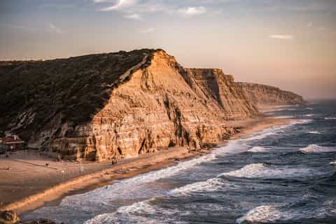 Countryside Tour: Surfing, Wine and History from Lisbon