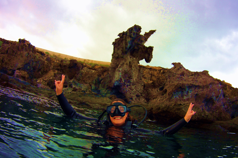 Snorkeling in a Volcanic Bay