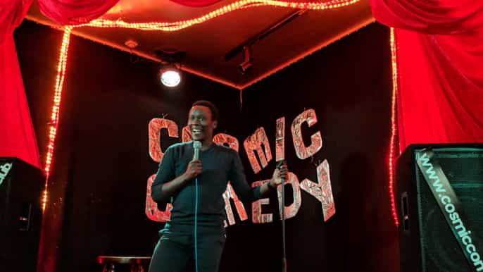 berlin cosmic comedy show with pizza and free shots