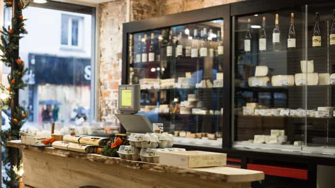cheese and wine tasting in a paris cheese cellar