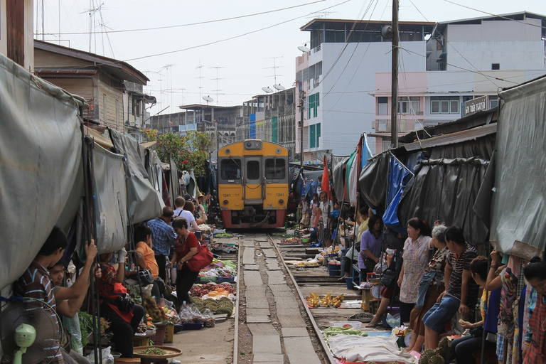 Damnoen Saduak Floating Market & Maeklong Train Market Tour Premium 9 seat with hotel pick up and drop off