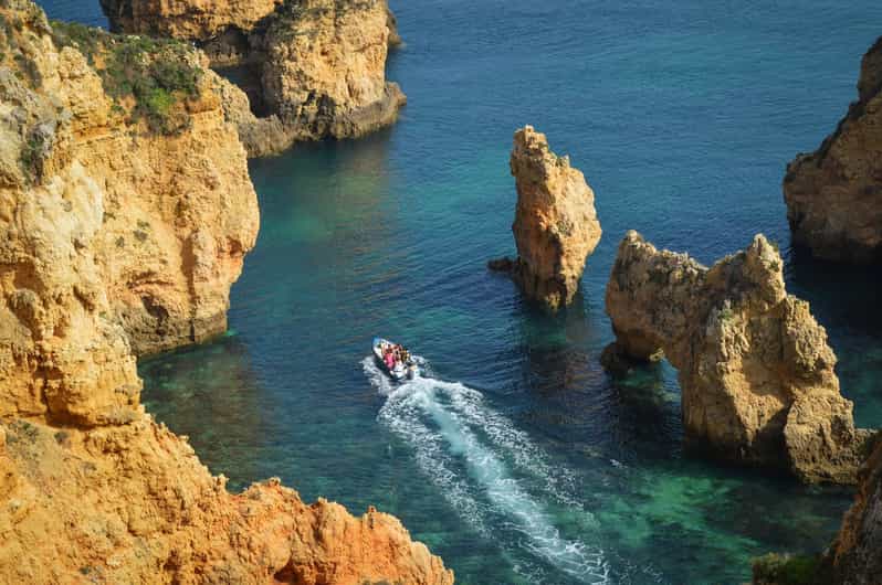 HalfDay from Portimão Convertible Car/Scooter & Boat Tour GetYourGuide