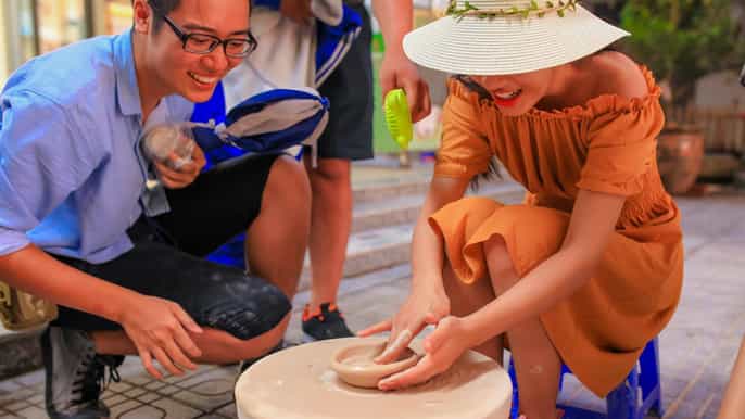 bat trang pottery ancient village by motorbike