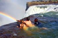From Victoria Falls, Livingstone Island Tour & Devils Pool - Housity
