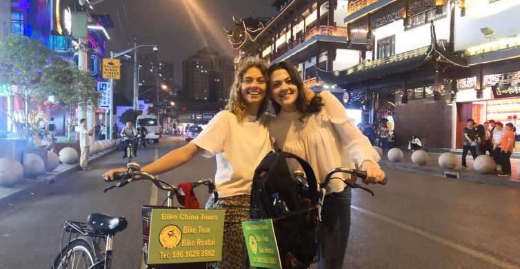 Shanghái: tour en bicicleta de 4 horas de aventuras nocturnas y degustación