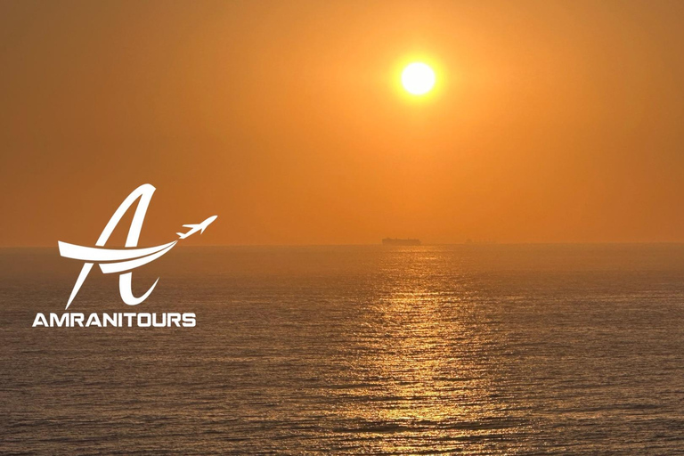 Paseo en camello al atardecer en la playa con cena incluida