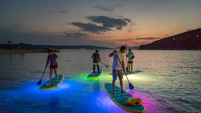 split stand up paddleboard night glow tour