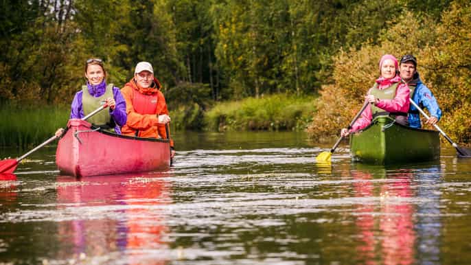 lapland canoeing trip with reindeer and husky farm tour