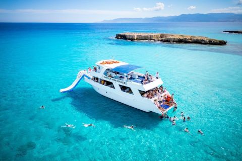 Paphos/Akamas: Blue Lagoon Bus & Boat Tour with Water Slide