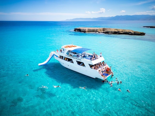 Visit Paphos/Akamas Blue Lagoon Bus & Boat Tour with Water Slide in cirali