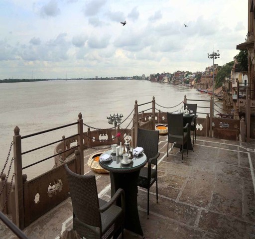 Visit Varanasi Morning Aarti with Boat Ride & Rooftop Breakfast in Varanasi