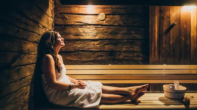 rovaniemi forest sauna with northern lights