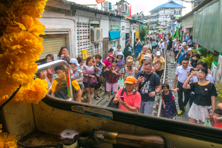 Damnoen Saduak Floating Market & Maeklong Train Market Tour Premium 9 seat with hotel pick up and drop off