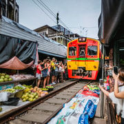 Damnoen Saduak Floating Market & Maeklong Train Market Tour