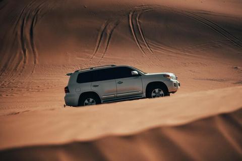 Doha: Sunset Desert Safari With Camel Ride & Dune Bashing Shared Desert Tour Pickup from meeting point Without Camel