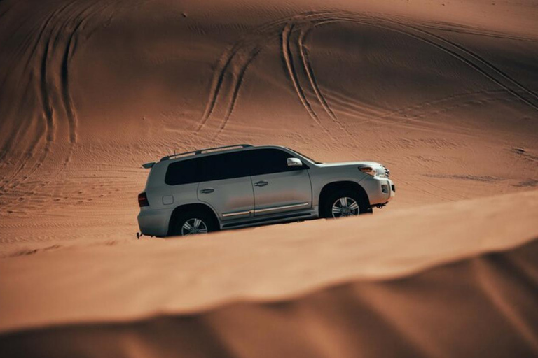 Doha: Sunset Desert Safari With Camel Ride & Dune Bashing Shared Desert Tour Pickup from meeting point Without Camel