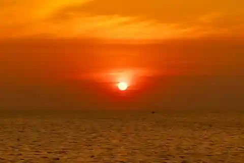 RedRiverTours - Enjoying Sunset & Night Squid Fishing