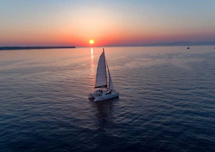 Santorini Sunset Cruise With Swim Stops Dinner And Drinks Getyourguide