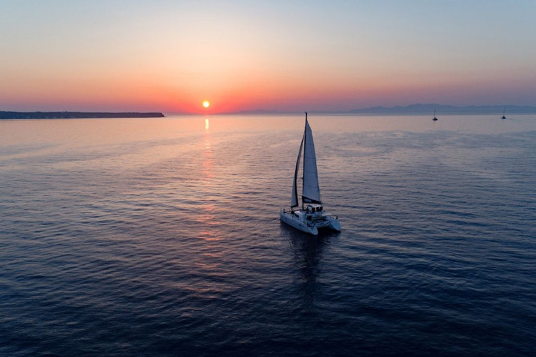 Santorini: Sunset Cruise with Swim Stops, Dinner, and Drinks