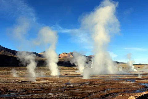 From San Pedro de Atacama: Tatio Geysers and Machuca Tour