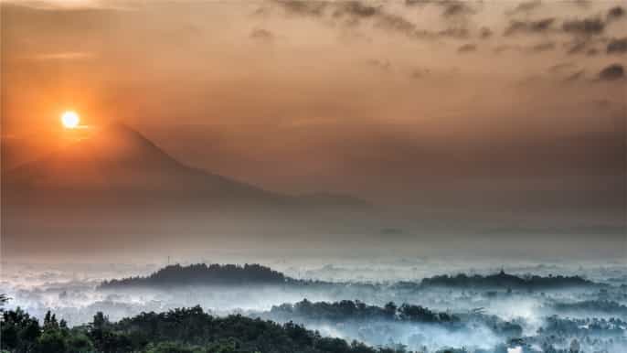 from yogyakarta borobudur sunrise on setumbu hill
